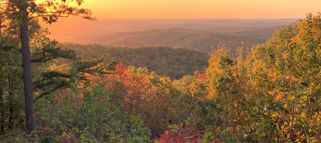 Sunset over hills in fall color