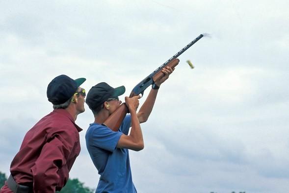 Mentor and youth shotgun shooting